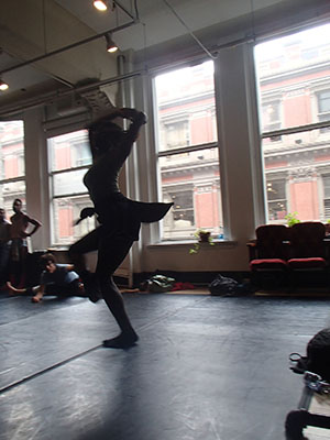 New A.I.M. dancer, statuesque Penda N’diaye, practices on the side during a rehearsal at Gina Gibney Studios.